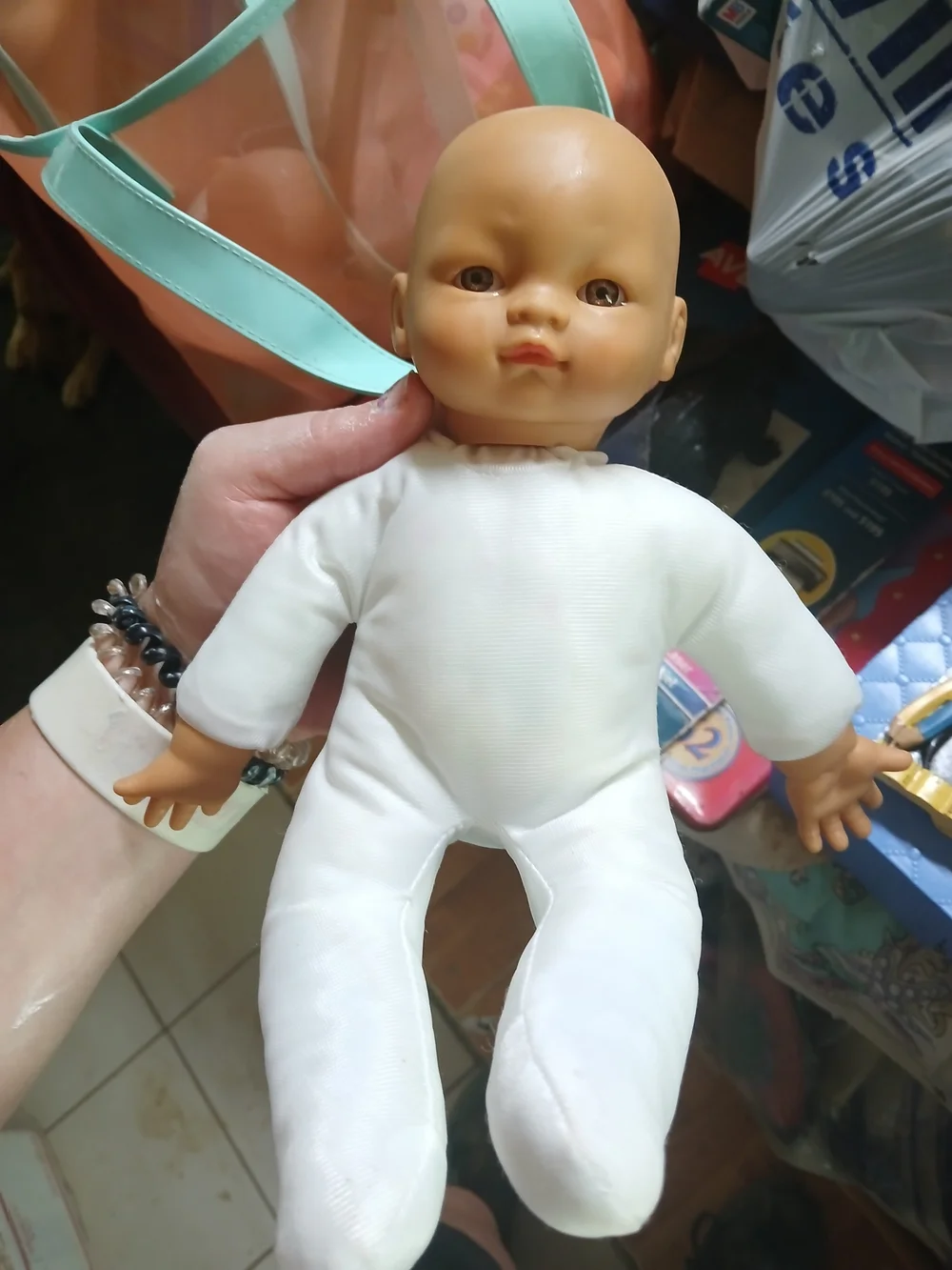 Uneeda baby doll with a soft cloth body and vinyl limbs